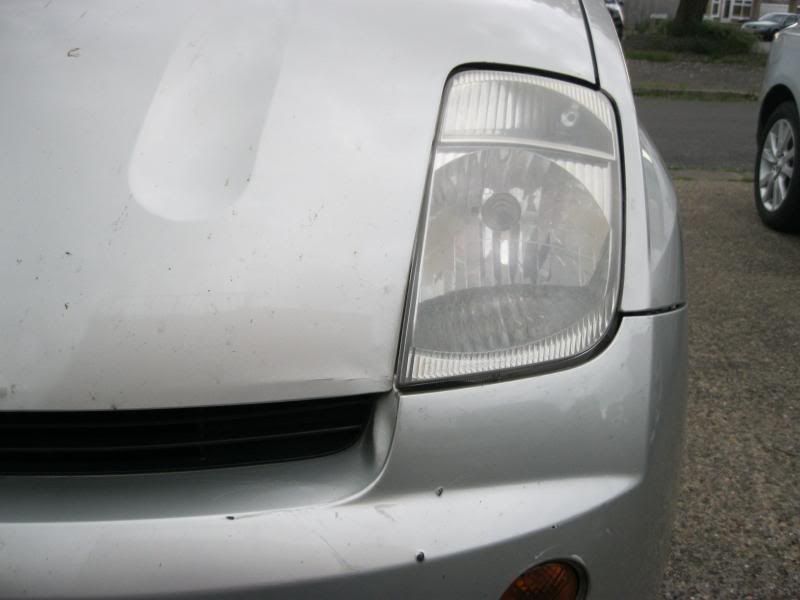 the damage round the headlight