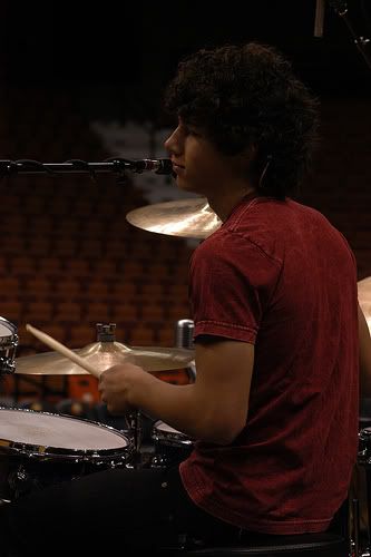 nick jonas playing drums