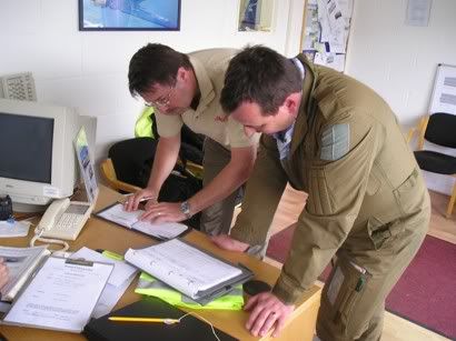 Me and Stuart sign the vital logbook for the T6 flight