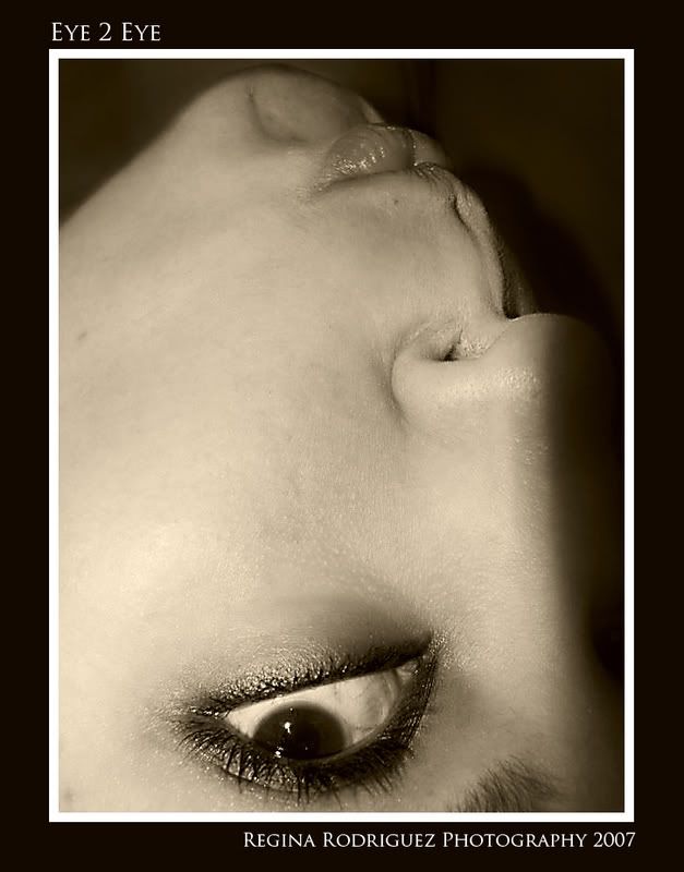 IMAGE: http://i73.photobucket.com/albums/i230/regina_emmanuelle/Candids/Eye2eyecopy.jpg