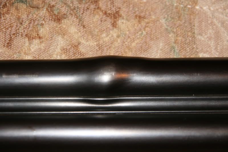 Image result for what a bulge on a gun barrel looks like
